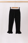 Black ruffle pants