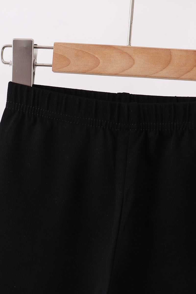 Black ruffle pants