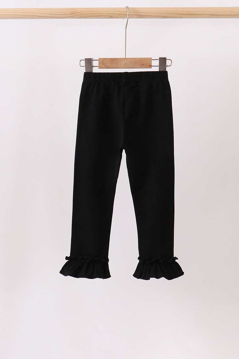 Black ruffle pants