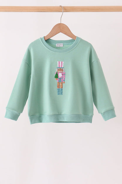 Sage Nutcracker Sequin Mom&me Top