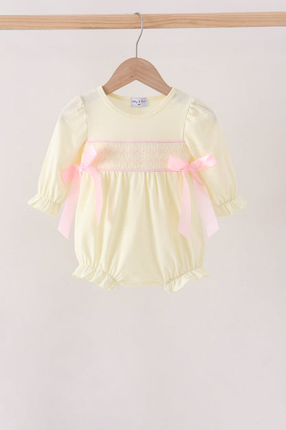 Cream smocked bow bubble